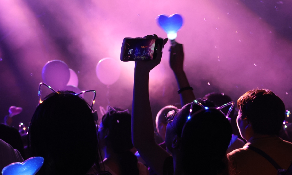 People enjoy themselves at a music festival celebrating the Qixi Festival in Yancheng, Jiangsu Province. Photo: VCG